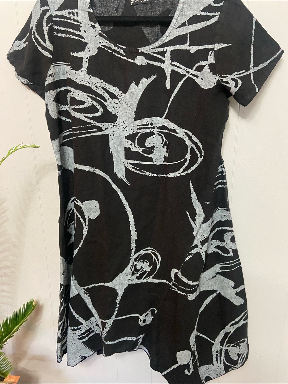 100% linen Fenini black with light blue pattern. money, artsy avant garde. Med